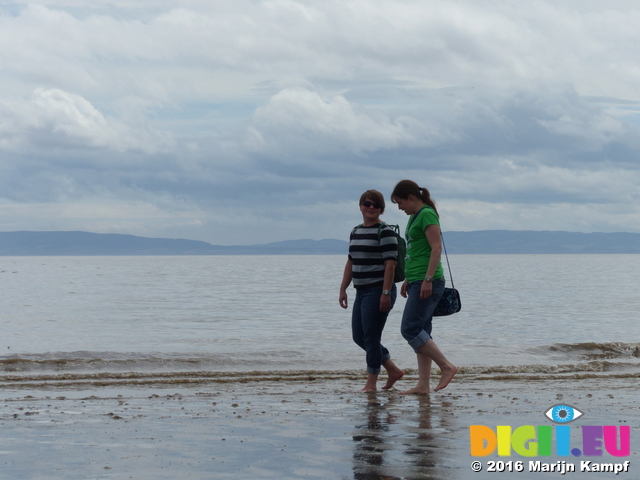 FZ030513 Jenni and Libby walking down Barry beach